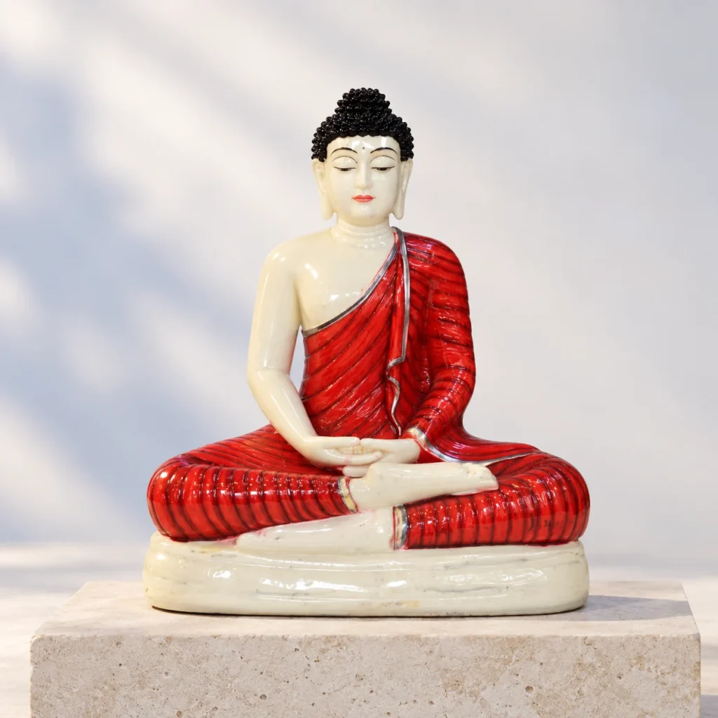 Styled product image of Ivory Buddha in Red Robe