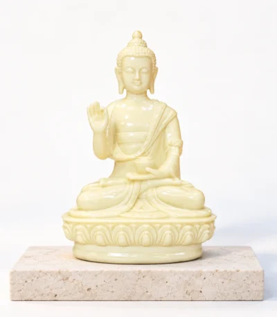 Styled product image of Ivory Buddha Statue