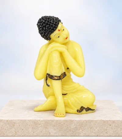 Styled product image of Yellow Resting Buddha