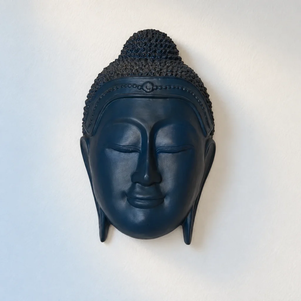 Styled product image of Blue Buddha Face Wall Accent