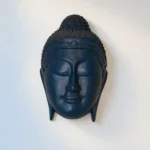 Styled product image of Blue Buddha Face Wall Accent