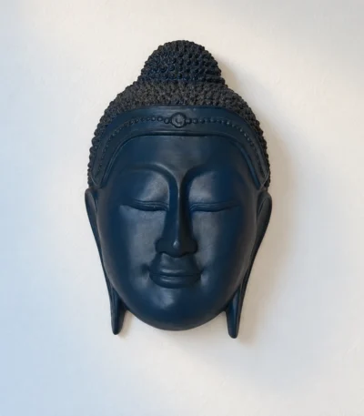 Styled product image of Blue Buddha Face Wall Accent