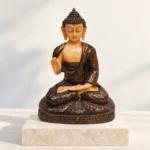 Styled product image of Bronze-Tone Buddha with Golden Shawl