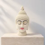 Styled product image of White Buddha Face Accent