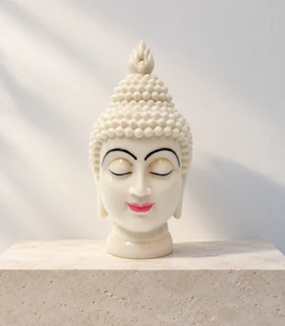 Styled product image of White Buddha Face Accent