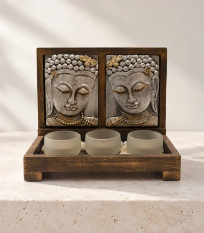 Styled product image of Twin Buddha Face Tealight Holder