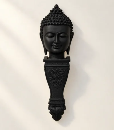 Styled product image of Black Buddha Face Wall Stand